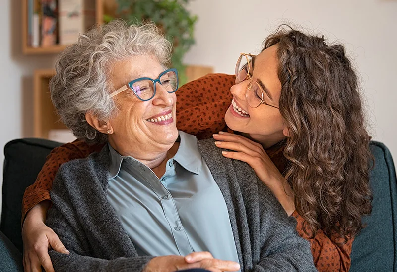 A CareRight care assistant supporting a client at home in Barton